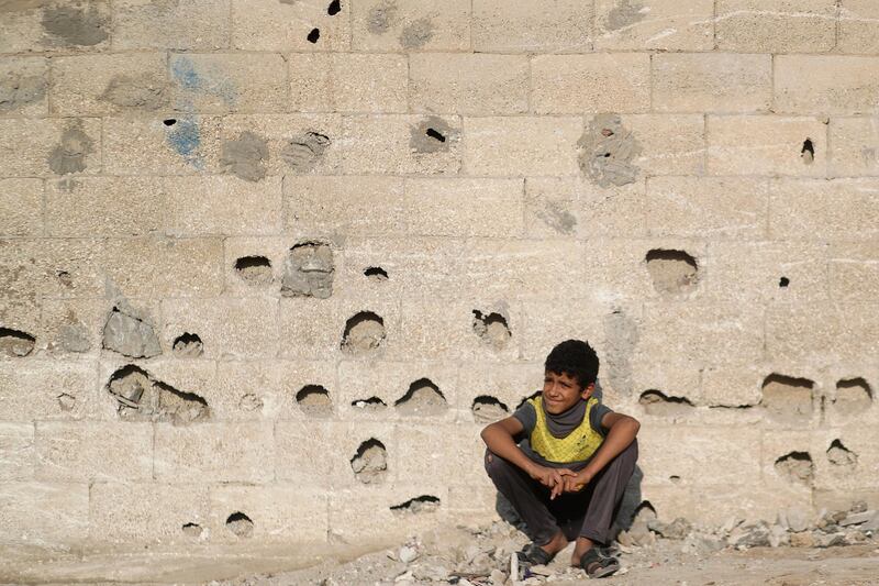 A boy watches a military show by Palestinian Islamic Jihad militants in Gaza City. Reuters