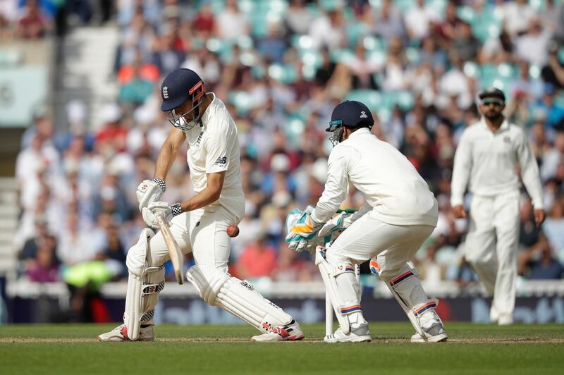 Cook, is caught out by India wicketkeeper Rishabh Pant off the bowling of India's Hanuma Vihari for 147. When he scored his 76th run of the innings, Cook became the fifth highest scoring individual batsman in Test cricket history, eclipsing Sri Lankan Kumar Sangakarra’s 12,400 runs. Cook ended his batting career on 12,472 runs. AP Photo