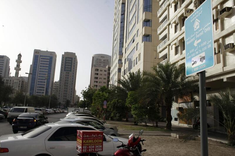 A Mawaqif sign in Abu Dhabi's Tourist club area. The Workplace Doctor explains whether a worker or employee should foot the bill for parking. Sammy Dallal / The National

