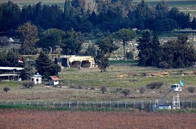 This picture taken from the Israeli-annexed Golan Heights on February 15, 2021, shows the border fence with the Syrian governorate of Quneitra / AFP / JALAA MAREY
