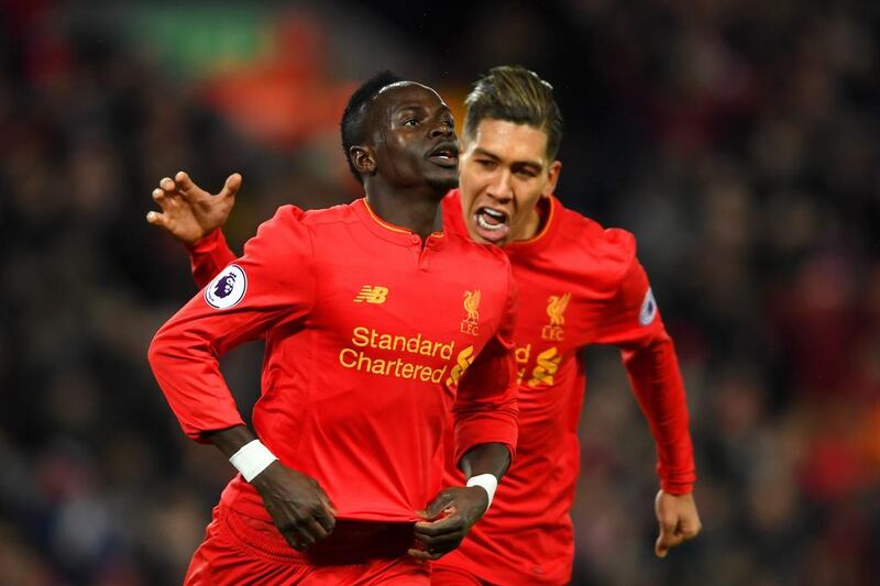 Liverpool's Sadio Mane and Roberto Firmino. Mike Hewitt / Getty Images