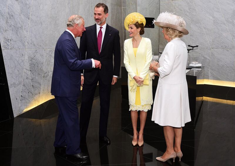 Prince Charles (L) and Camilla (R), Duchess of Cornwall, greet King Felipe VI (2-L) and Queen Letizia (2-R) at their hotel in central London.