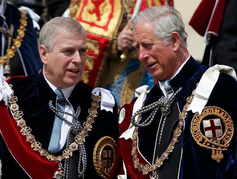 Prince Andrew and Prince Charles at the Order of the Garter Service at Windsor Castle in 2015. Getty