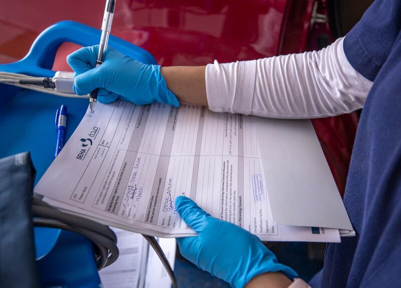 Residents are a big show for PCR and vaccination tests at the  SEHA Covid-19 Drive-Through Service Center at the Corniche in Abu Dhabi on June 17th, 2021.  There is a huge demand for vaccinations and PCRs after the green pass restrictions. Victor Besa / The National.
Reporter: Shireena Al Nowais for News