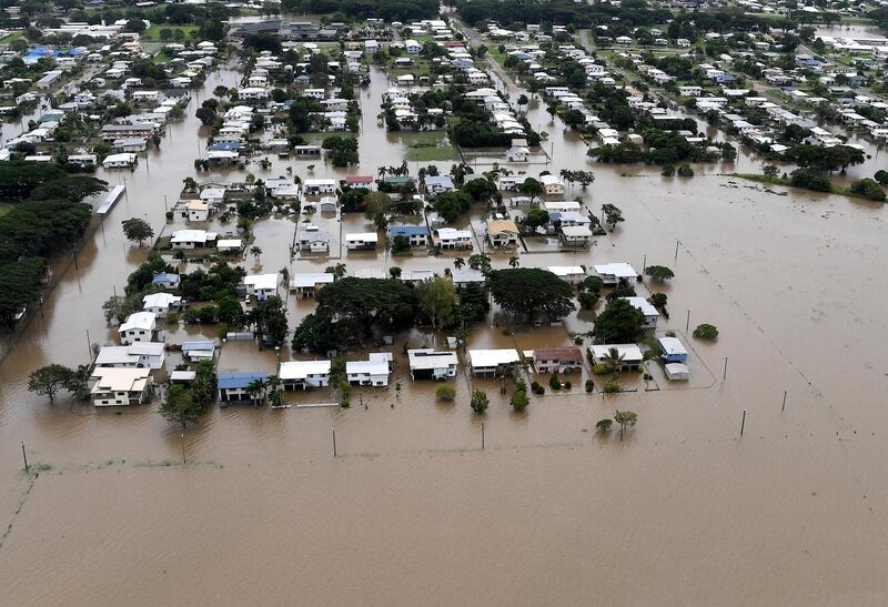 Houses seen surrounded by flood waters in the town of Ingham, located in North Queensland, Australia. Dan Peled / Reuters