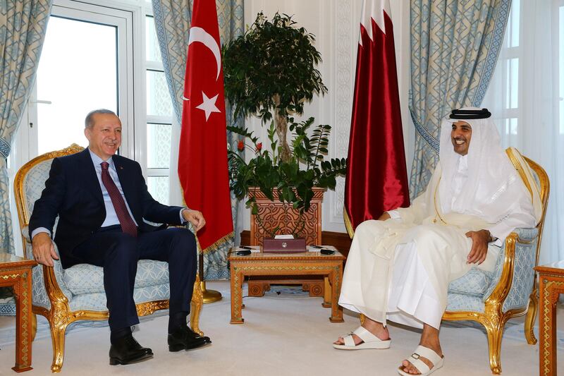 Turkey's President Tayyip Erdogan meets with Qatar's Emir Sheikh Tamim bin Hamad al-Thani in Doha, Qatar, November 15, 2017. Kayhan Ozer/Presidential Palace/Handout via REUTERS ATTENTION EDITORS - THIS PICTURE WAS PROVIDED BY A THIRD PARTY. NO RESALES. NO ARCHIVE.