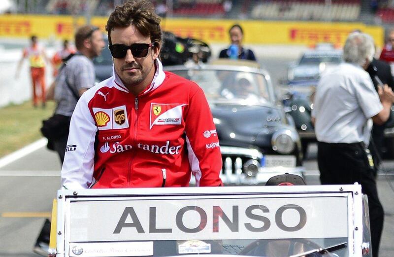 Ferrari driver Fernando Alonso arrives at Sunday's Spanish Grand Prix. Tom Gandolfini / AFP / May 11, 2014 