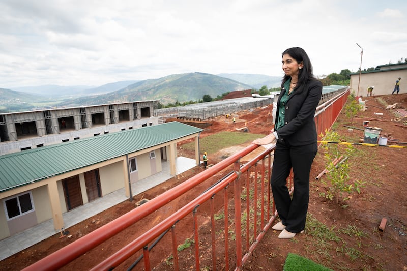 Ms Braverman at a building site on the outskirts of Kigali during her visit to Rwanda in March to see houses being constructed that could eventually house deported migrants from the UK. PA