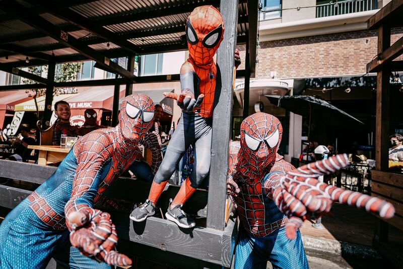 Spider-Men, young and old, seen at the famed US weekender. AFP
