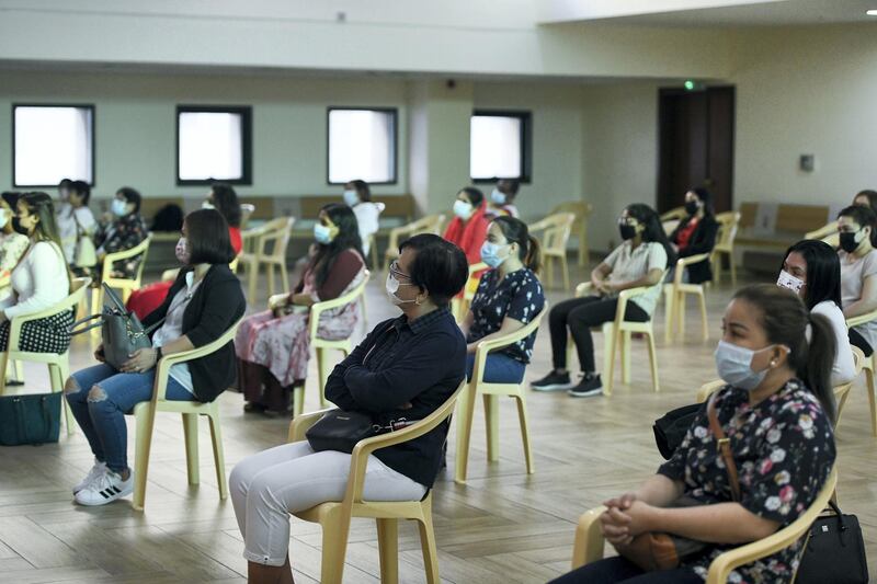 Abu Dhabi, United Arab Emirates - Worshippers follow guidelines and social distance during Christmas mass at Bishop Paul Hinder Jubilee Memorial Parish Hall in St. JosephÕs Cathedral, in Mushrif. Khushnum Bhandari for The National