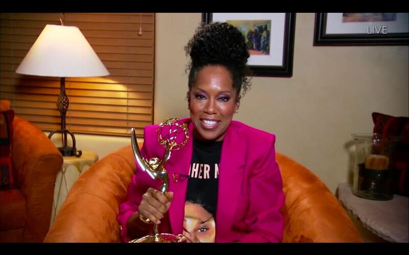Regina King wears a Breonna Taylor shirt as she wins the Emmy for Outstanding Lead Actress In A Limited Series Or Movie for 'Watchmen' during the 72nd Primetime Emmy Awards. AFP