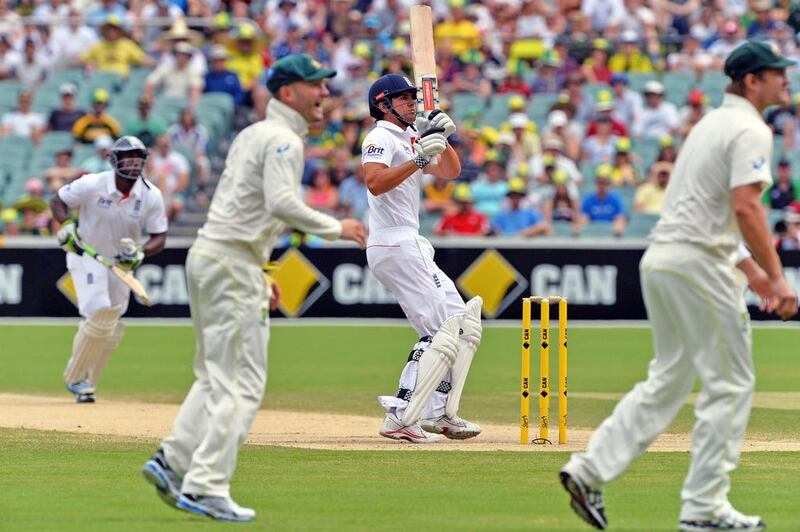 Alastair Cook, centre, and England are trying to find where they went wrong after Australia won the second Ashes Test on Monday by another massive margin. Saeed Khan / AFP