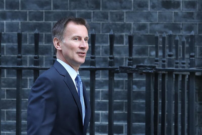 Britain's Foreign Secretary Jeremy Hunt arrives for the weekly cabinet meeting at 10 Downing Street in London on February 26, 2019. Prime Minister Theresa May faced the threat Tuesday of more ministerial resignations over her refusal to rule out the possibility of Britain crashing out of the European Union without a deal on March 29. / AFP / Daniel LEAL-OLIVAS
