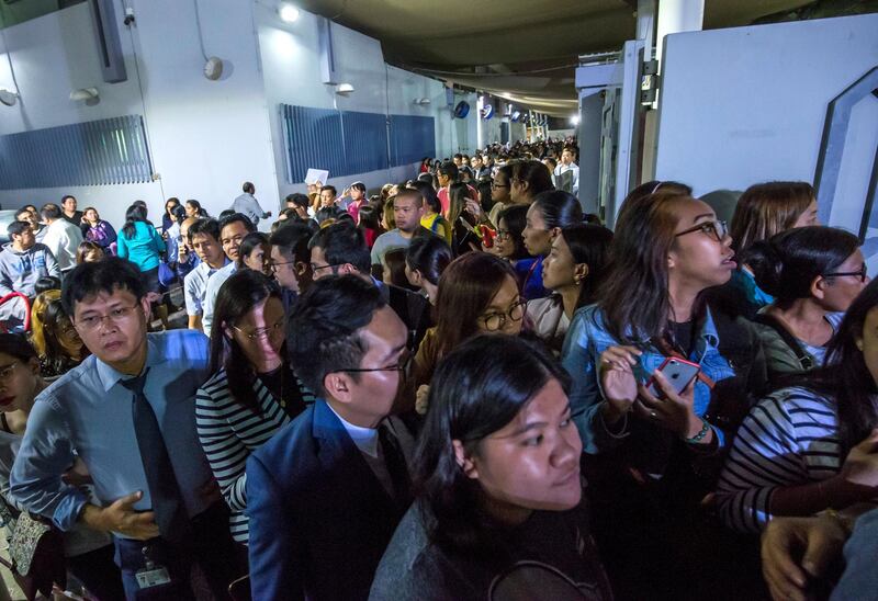 DUBAI, UNITED ARAB EMIRATES -Crowd waiting to get their tickets for the Papal Mass on February 3, 2018 in Abu Dhabi at St. Mary's Catholic Church, Oud Mehta.  Leslie Pableo for The National for Patrick Ryan's story