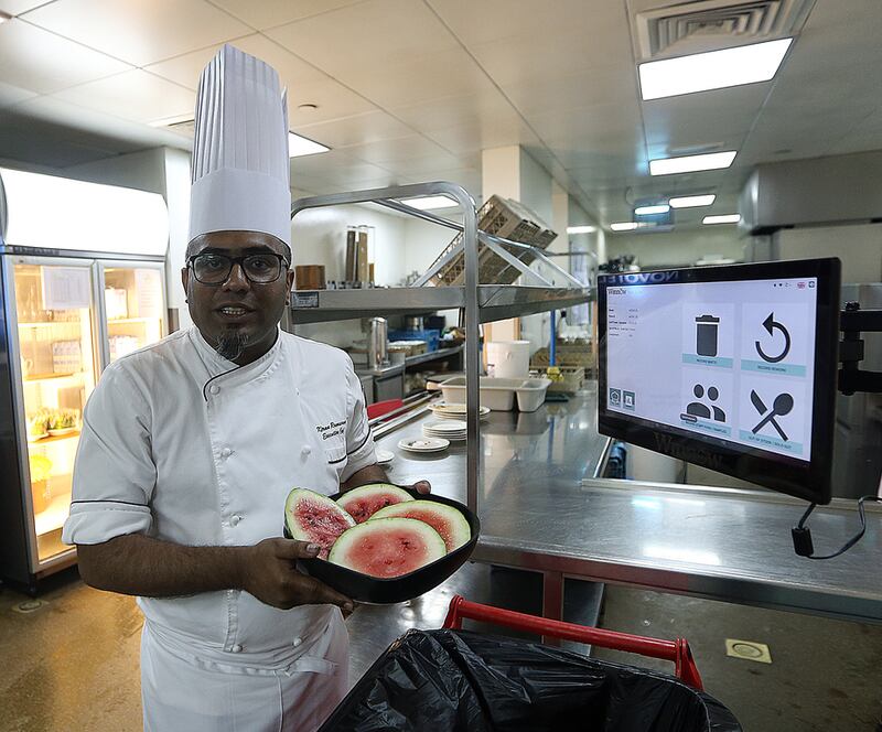 Complex executive chef, Kiran Ramsaran explains how to cut down on food wastage during Ramadan Iftars using waste-measuring equipment at the Novotel in Dubai. Satish Kumar / The National