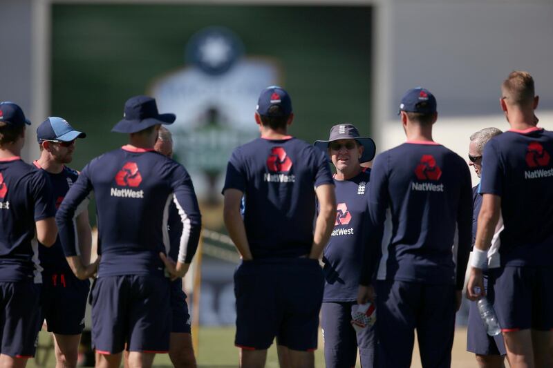 England's head coach Trevor Bayliss, fourth right, talks to players before the second day of their Ashes cricket test match against Australia in Sydney, Friday, Jan. 5, 2018. (AP Photo/Rick Rycroft)