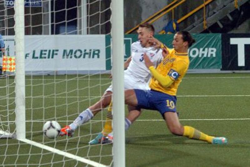 Zlatan Ibrahimovic bundles home Sweden's second goal against the Faroe Islands