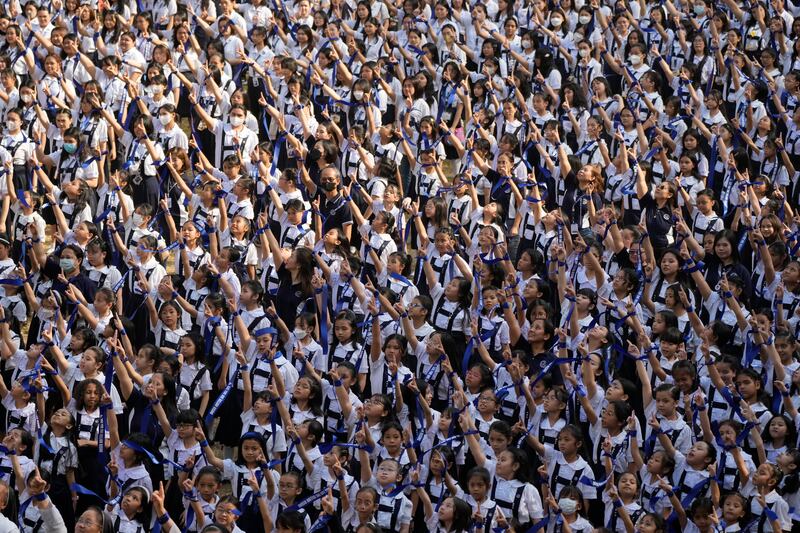St Scholastica's College students during a campaign to help eradicate violence against women and children, in Manila, Philippines. AP