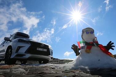 Travel enthusiasts build a snowman on Jebel Jais. The mercury hit -0.1 °C in January 2020, leaving the UAE's highest peak under a blanket of snow. Courtesy: Ahmed Al Bedwawi