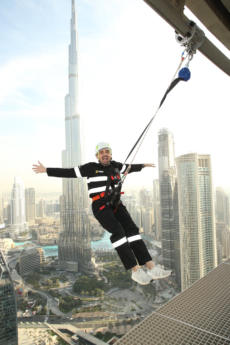People can lean off the edge 219 metres up in the sky. Photo: Sky Views Dubai