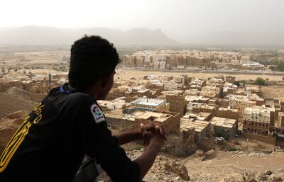 Mandatory Credit: Photo by Yahya Arhab/EPA-EFE/Shutterstock (9760692ah)
A Yemeni sits on a mountain overlooking the mud-brick 'skyscrapers' of the ancient walled city of Shibam in Hadramout province, Yemen, 12 July 2018. Yemen's ancient walled city of Shibam is the oldest metropolis in the world to use vertical construction, which dates back to the 16th century. It is famed as the Manhattan of Desert because of its 600 inhabitable mud-built 'skyscrapers' which are seven or eight stories high. It was declared a World Cultural Heritage site by the United Nations Educational, Scientific and Cultural Organization (UNESCO) in 1982.
The ancient walled city of Shibam in Yemen - 12 Jul 2018