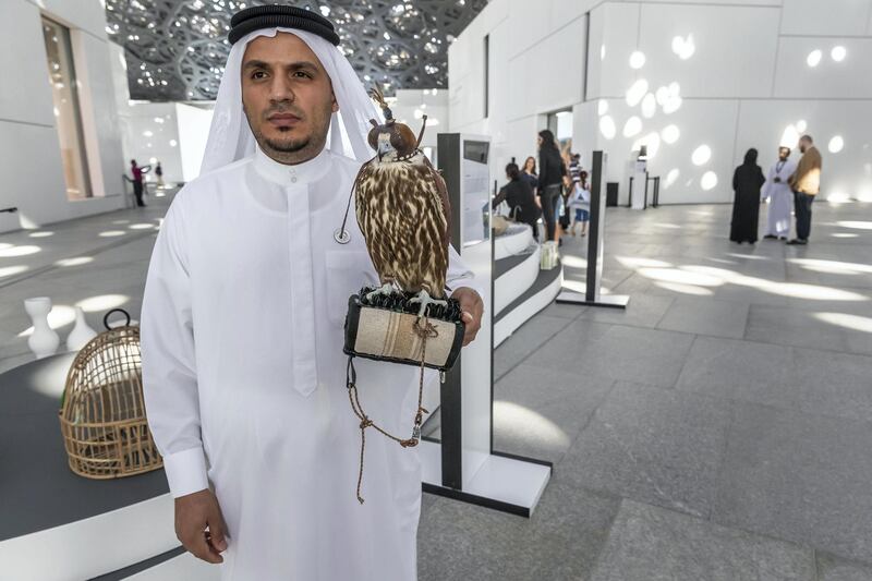 ABU DHABI, UNITED ARAB EMIRATES. 01 DECEMBER 2018. BIGPICTURE OPTION. UAE National Day Program at the Louvre Abu Dhabi. Falconry on display for visitors during the exhibition. (Photo: Antonie Robertson/The National) Journalist: None. Section: National.