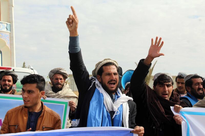 Afghan protesters shout slogans during a demonstration for peace in Kandahar, Afghanistan.  EPA