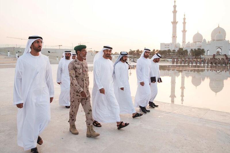 The Crown Prince of Abu Dhabi visits Wahat Al Karama with Mohammed Al Mazrouei, Lt Gen Hamad Al Romaithi, Sheikh Khalifa bin Tahnoon, and Mohammed Al Mubarak. Ryan Carter / Crown Prince Court — Abu Dhabi