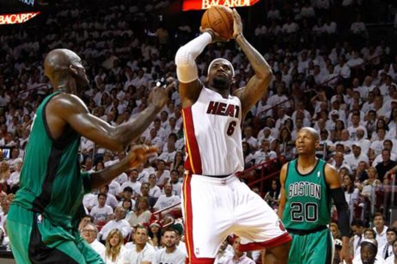 MIAMI, FL - MAY 28: LeBron James #6 of the Miami Heat attempts a shot in the second half against Kevin Garnett #5 and Ray Allen #20 of the Boston Celtics in Game One of the Eastern Conference Finals in the 2012 NBA Playoffs on May 28, 2012 at American Airlines Arena in Miami, Florida. NOTE TO USER: User expressly acknowledges and agrees that, by downloading and or using this photograph, User is consenting to the terms and conditions of the Getty Images License Agreement.   Mike Ehrmann/Getty Images/AFP== FOR NEWSPAPERS, INTERNET, TELCOS & TELEVISION USE ONLY ==

