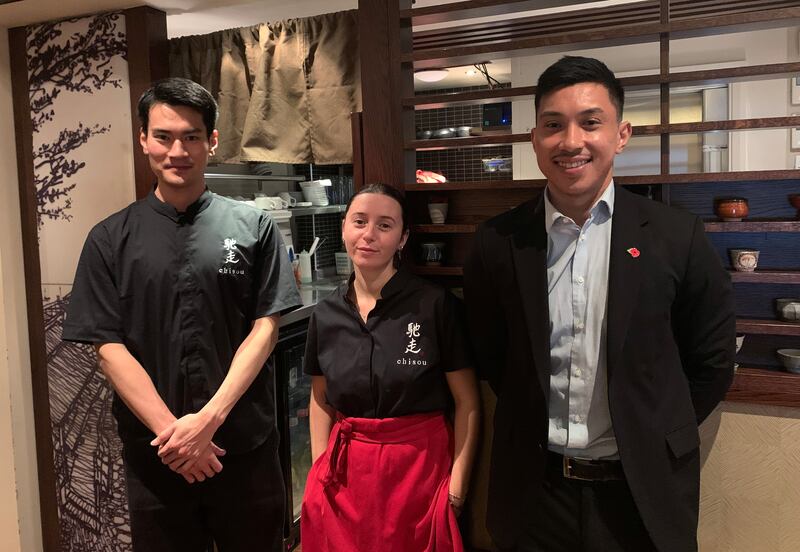 John Farrell, right, assistant manager at Chisou Japanese restaurant in Knightsbridge, said if ministers re-impose QR codes and social distancing rules it will be a hassle for businesses. Photo: The National