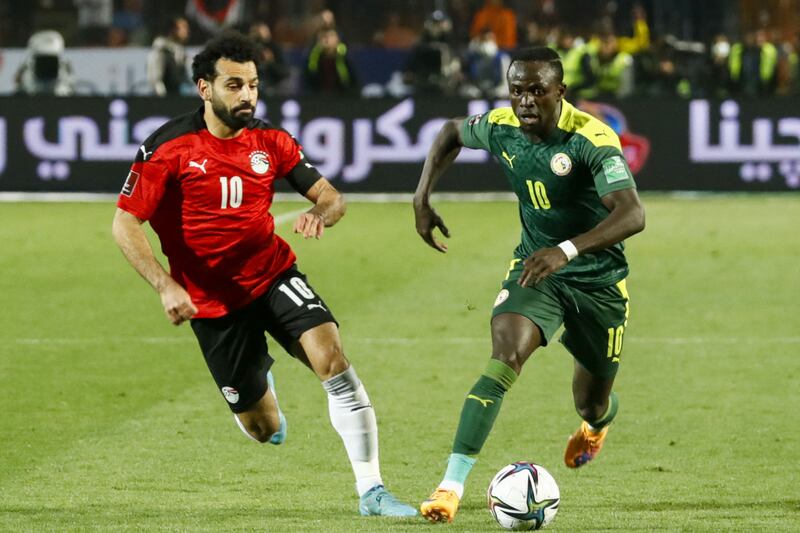 Egypt's Mohamed Salah vies for the ball with Senegal's forward Sadio Mane. AFP
