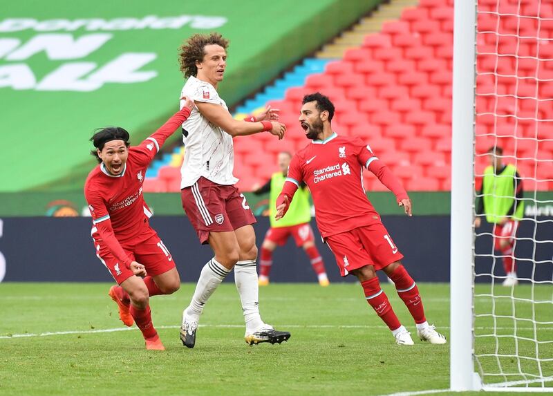 Takumi Minamino celebrates his goal. EPA