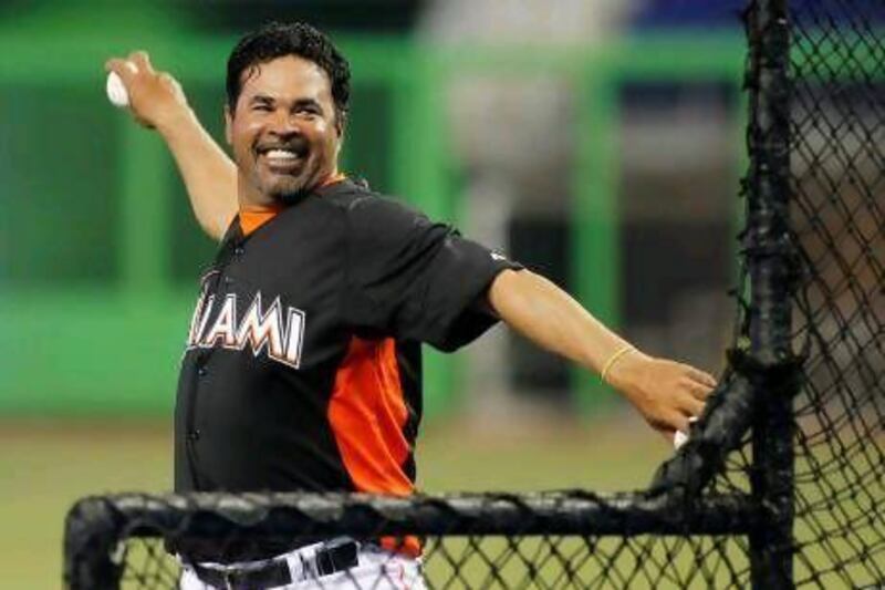 It's all new in South Florida, where the Marlins have dropped the "Florida" and added "Miami" to their name and will don new uniforms in a new stadium when they trot out new faces Jose Reyes, Heath Bell and Mark Buerhle to play for new manager Ozzie Guillen, above.