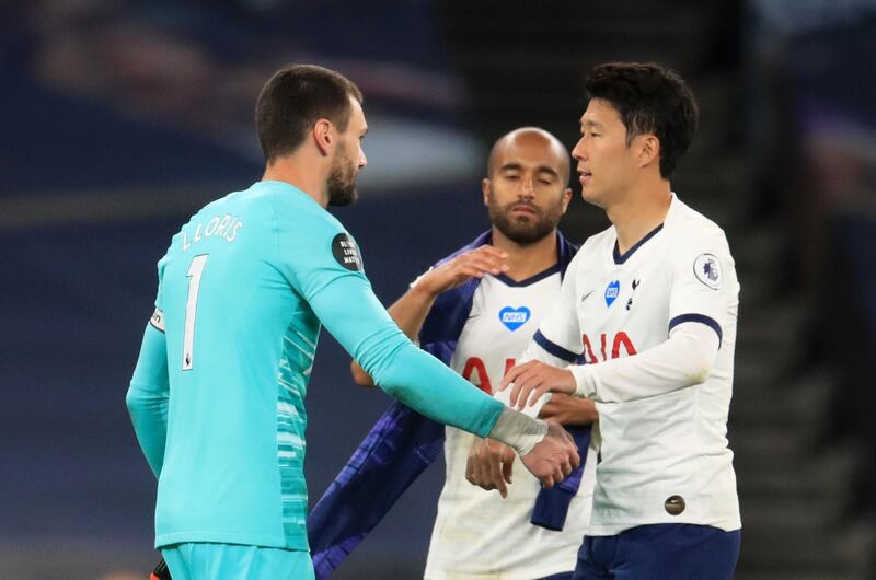 Hugo Lloris celebrates with Son Heung-min after the match. Reuters
