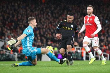 LONDON, ENGLAND - DECEMBER 15: Bernd Leno of Arsenal makes a save from Gabriel Jesus of Manchester City during the Premier League match between Arsenal FC and Manchester City at Emirates Stadium on December 15, 2019 in London, United Kingdom. (Photo by Julian Finney/Getty Images)