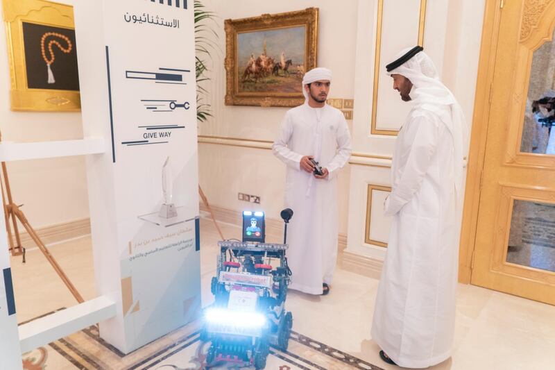 ABU DHABI, UNITED ARAB EMIRATES - October 23, 2018: HH Sheikh Mohamed bin Zayed Al Nahyan Crown Prince of Abu Dhabi Deputy Supreme Commander of the UAE Armed Forces (R), views the projects of the winners of The National Science, Technology and Innovation Festival, during a Sea Palace barza. 

(Rashed Al Mansoori / Crown Prince Court - Abu Dhabi )
---