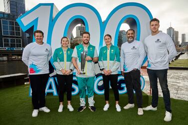 MELBOURNE, AUSTRALIA - JULY 08: (L-R) Shane Watson, Georgia Wareham, Aaron Finch, Tayla Vlaeminck, Waqar Younis and Morne Morkel pose during the T20 World Cup Trophy Tour Launch at Crown Riverwalk on July 08, 2022 in Melbourne, Australia. (Photo by Graham Denholm / Getty Images)