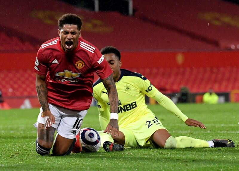 Newcastle United's Joe Willock fouls Marcus Rashford, resulting in a penalty. PA