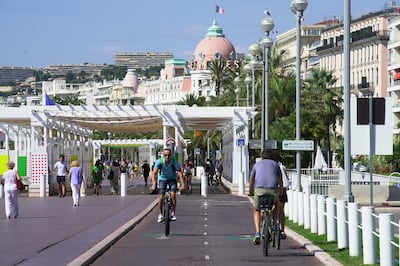 The Promenade des Anglais with Le Negresco hotel in the background. Bloomberg