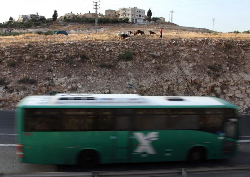 Palestinians are now being banned from buses used by Israeli settlers. Jim Hollander / EPA