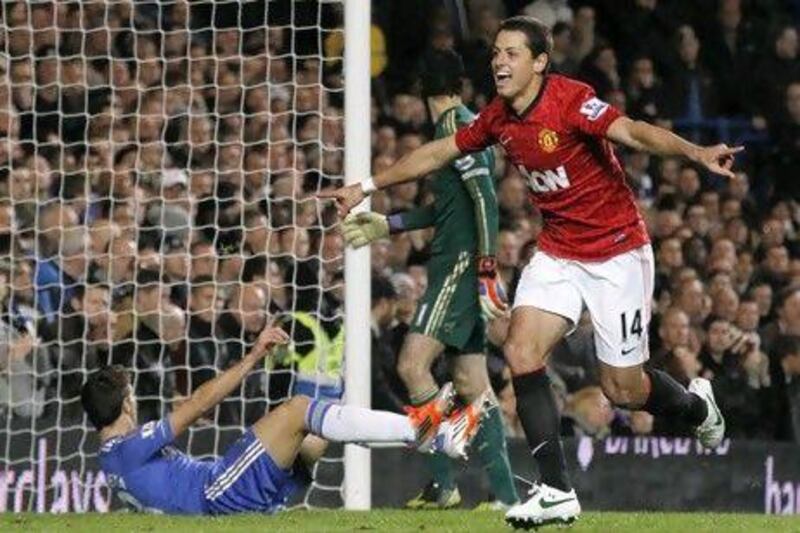 Manchester United's Javier Hernandez, right, celebrates his goal against Chelsea.