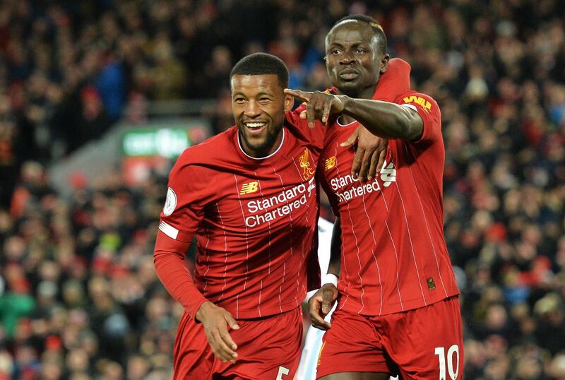 epa08245192 Sadio Mane (R) of Liverpool celebrates with teammate Georginio Wijnaldum after scoring his team's fourth goal which was disallowed for offside during the English Premier League match between Liverpool and West Ham in Liverpool, Britain, 24 February 2020.  EPA/PETER POWELL EDITORIAL USE ONLY. No use with unauthorized audio, video, data, fixture lists, club/league logos or 'live' services. Online in-match use limited to 120 images, no video emulation. No use in betting, games or single club/league/player publications