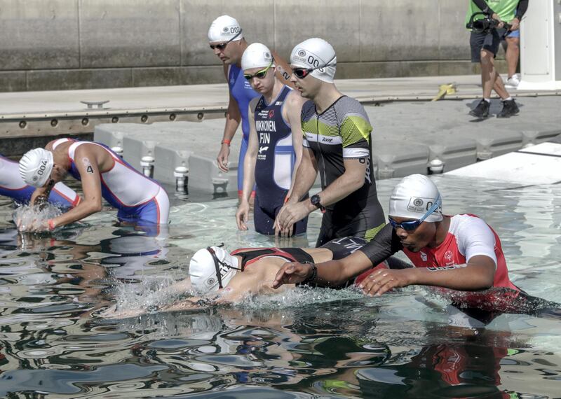 Abu Dhabi, United Arab Emirates, March 8, 2019.  Special Olympics ITU Traiathlon at the YAS Marina Circuit. --(R) Jonah Hambleton at the start of the race. 
Victor Besa/The National
Section:  NA
Reporter:  Haneen Dajani