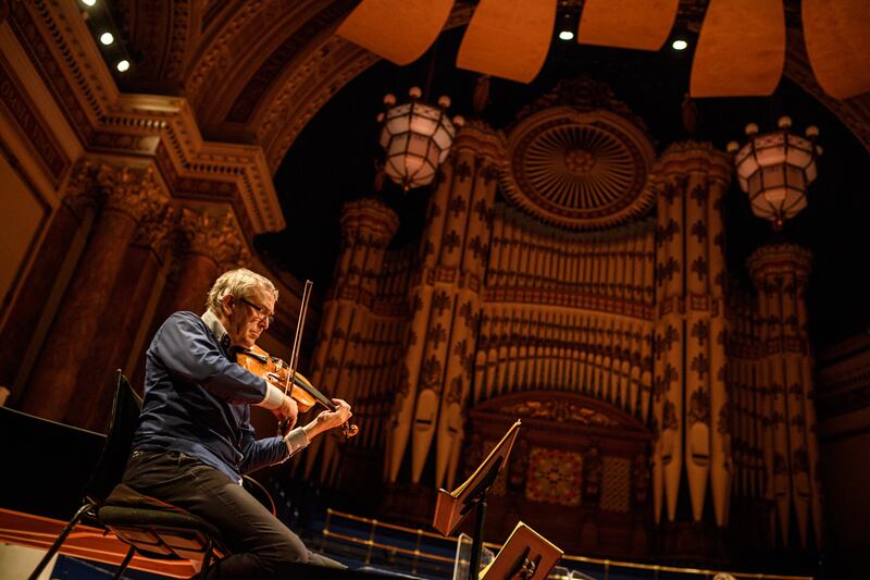 Musicians from the Orchestra of Opera North rehearse in Leeds Town Hall, in 2020. AFP