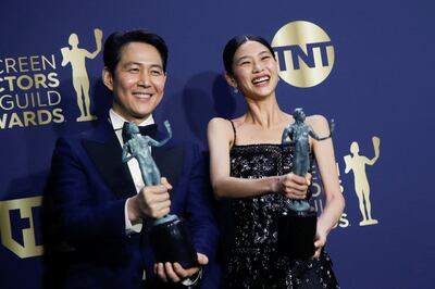 Actors Lee Jung-jae and Jung Ho-yeon backstage with their awards for Outstanding Performance by a Male Actor and Female Actor in a Drama Series at the 28th Screen Actors Guild Awards. Reuters