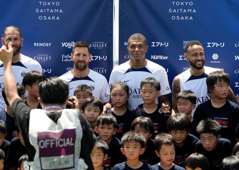 Ramos, Lionel Messi, Kylian Mbappe and Neymar pose for a group photo. EPA