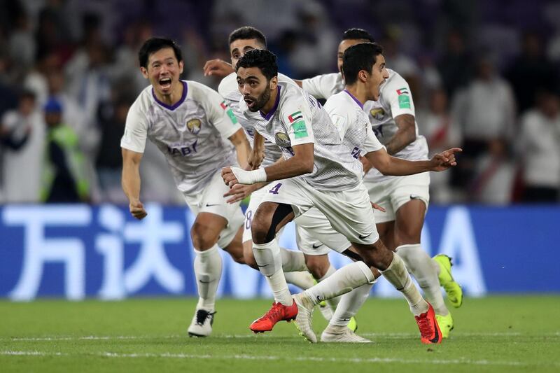 Hussein El Shahat of Al Ain and his team mates celebrate. Getty Images