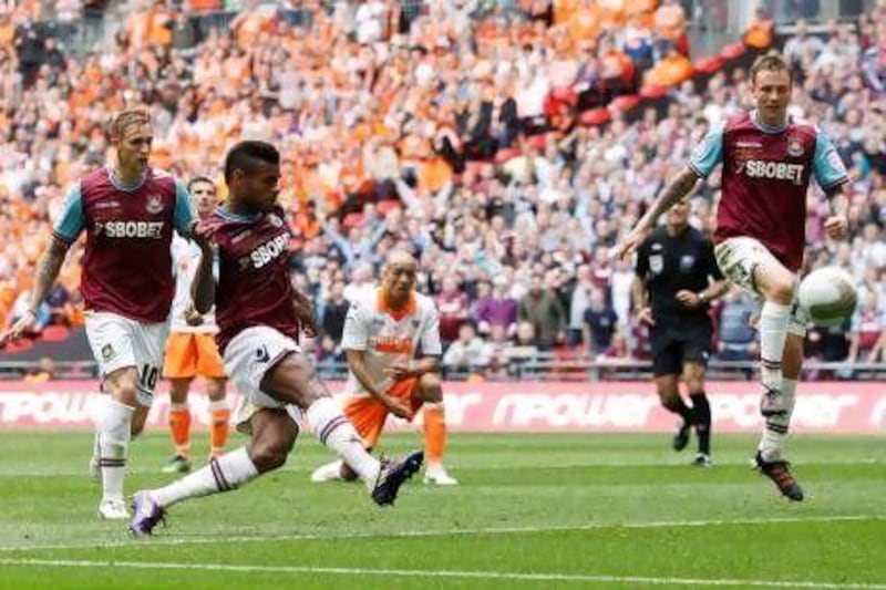 Ricardo Vaz Te, second left, fires in the 87th-minute winner that clinched West Ham's place back in the Premier League. Andrew Boyers / Action Images