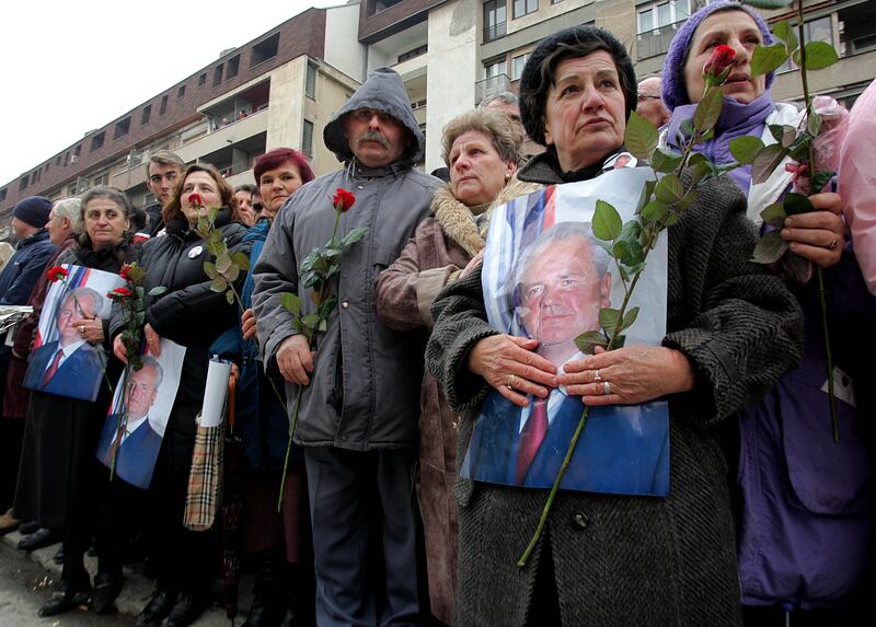 Supporters of Milosevic mourn their idol as they line the route of the funeral procession on March 18, 2006, in Pozarevac, Serbia and Montenegro. He died in his prison cell in The Hague while being tried for crimes against humanity. Getty Images