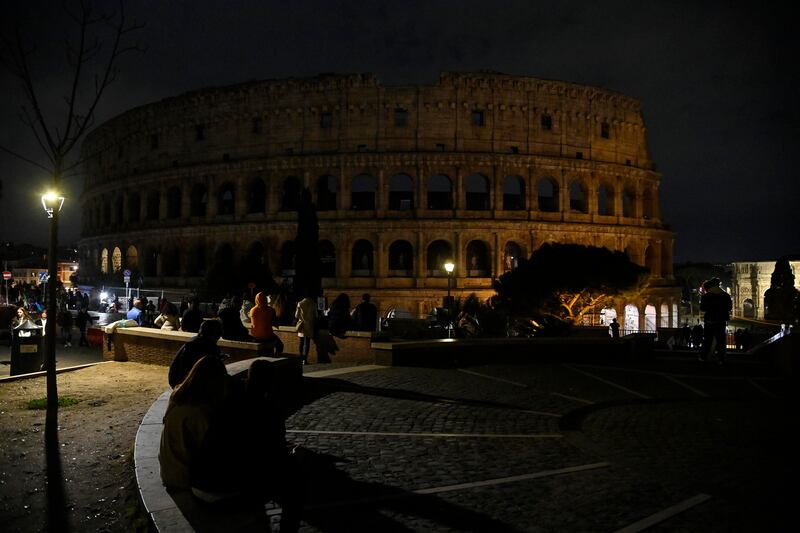 Lights at the Colosseum are switched off for the Earth Hour environmental campaign in Rome, Italy. EPA